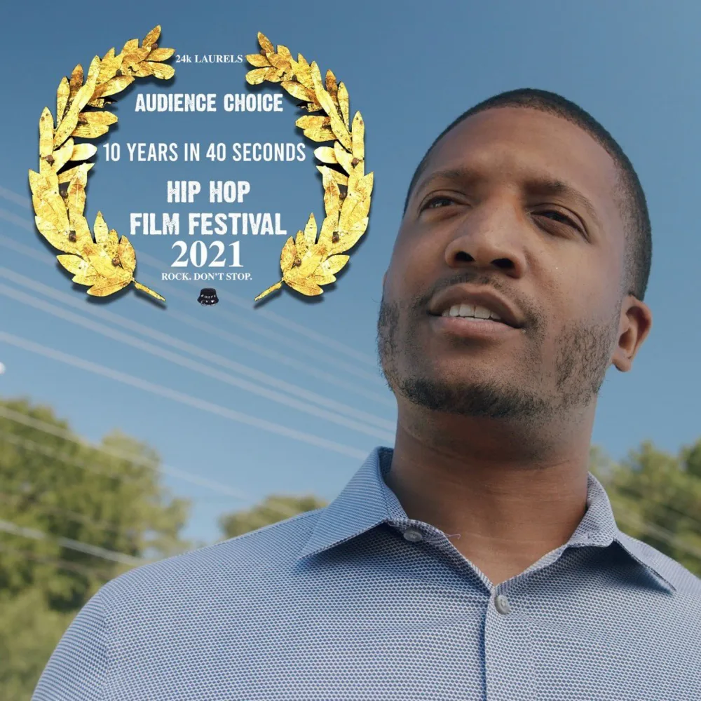 Jae with the Hip Hop Film Festival 2021 Audience Choice laurel